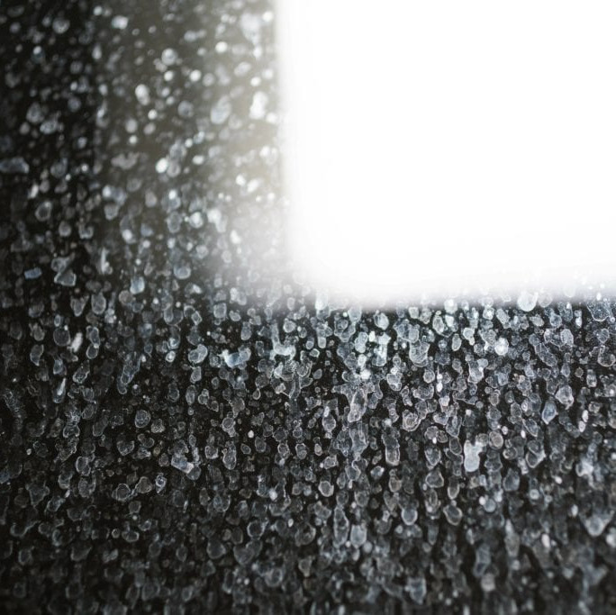 Cloudy etched shower glass needing polishing
